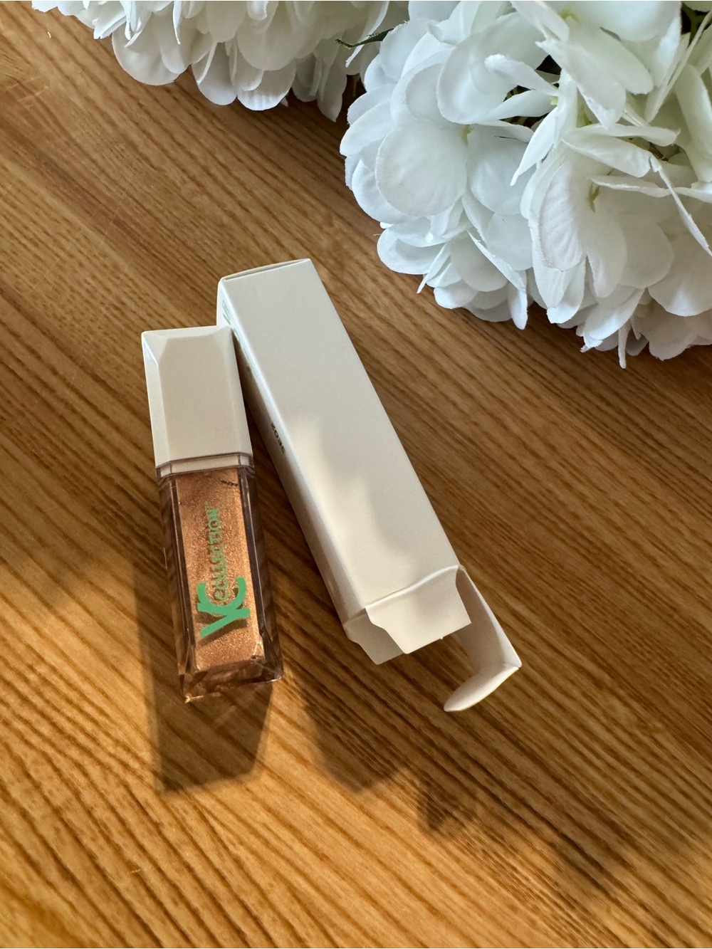 Iridescent Bronze Lip Gloss Shimmer Bronze Shade YC collection color creamsicle